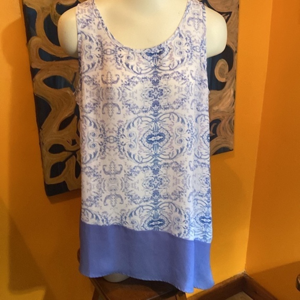 Sleeveless Tunic with Asymmetrical Hem